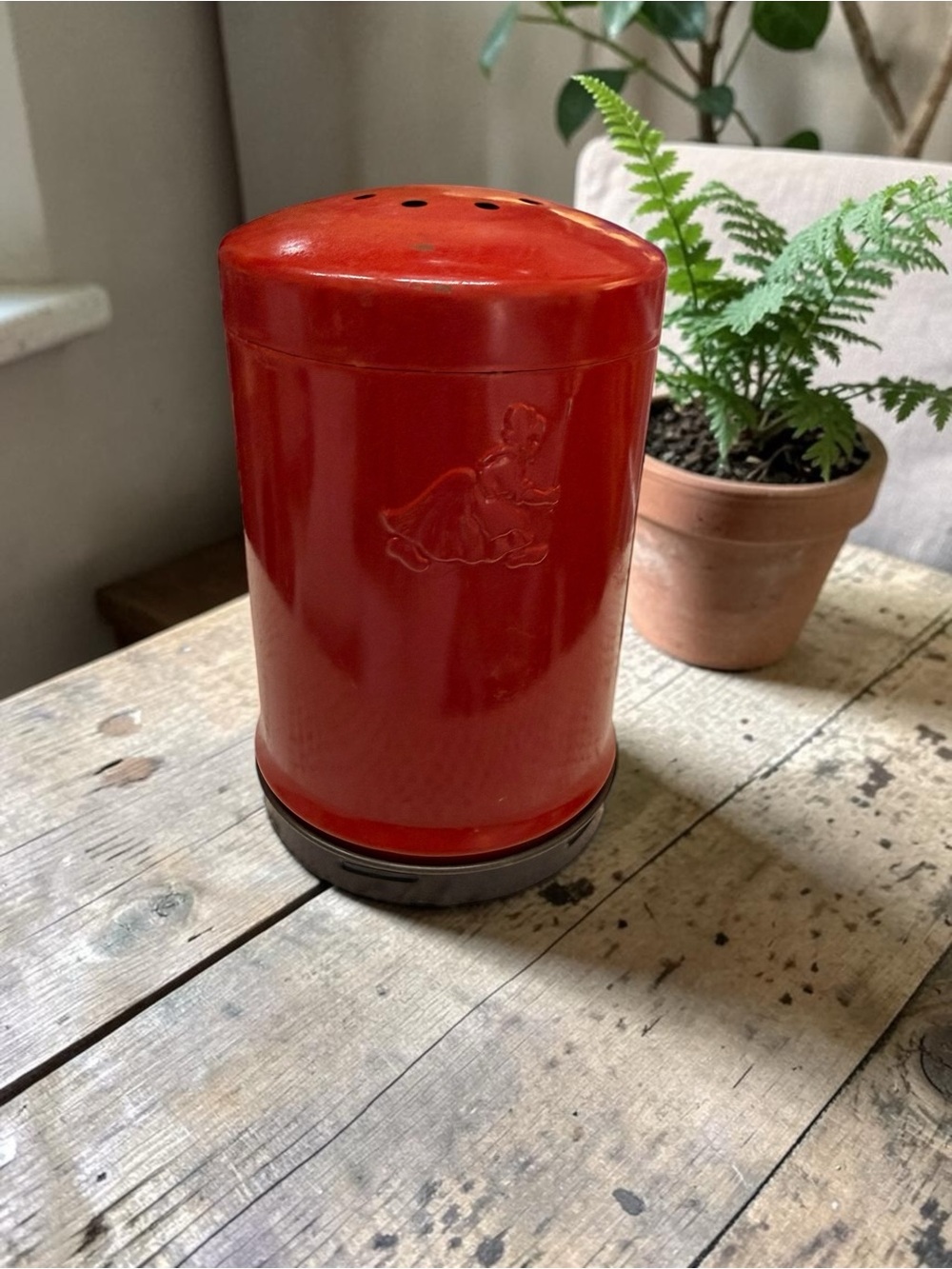 Vintage red embossed Old Dutch Cleanser tin shaker dispenser.